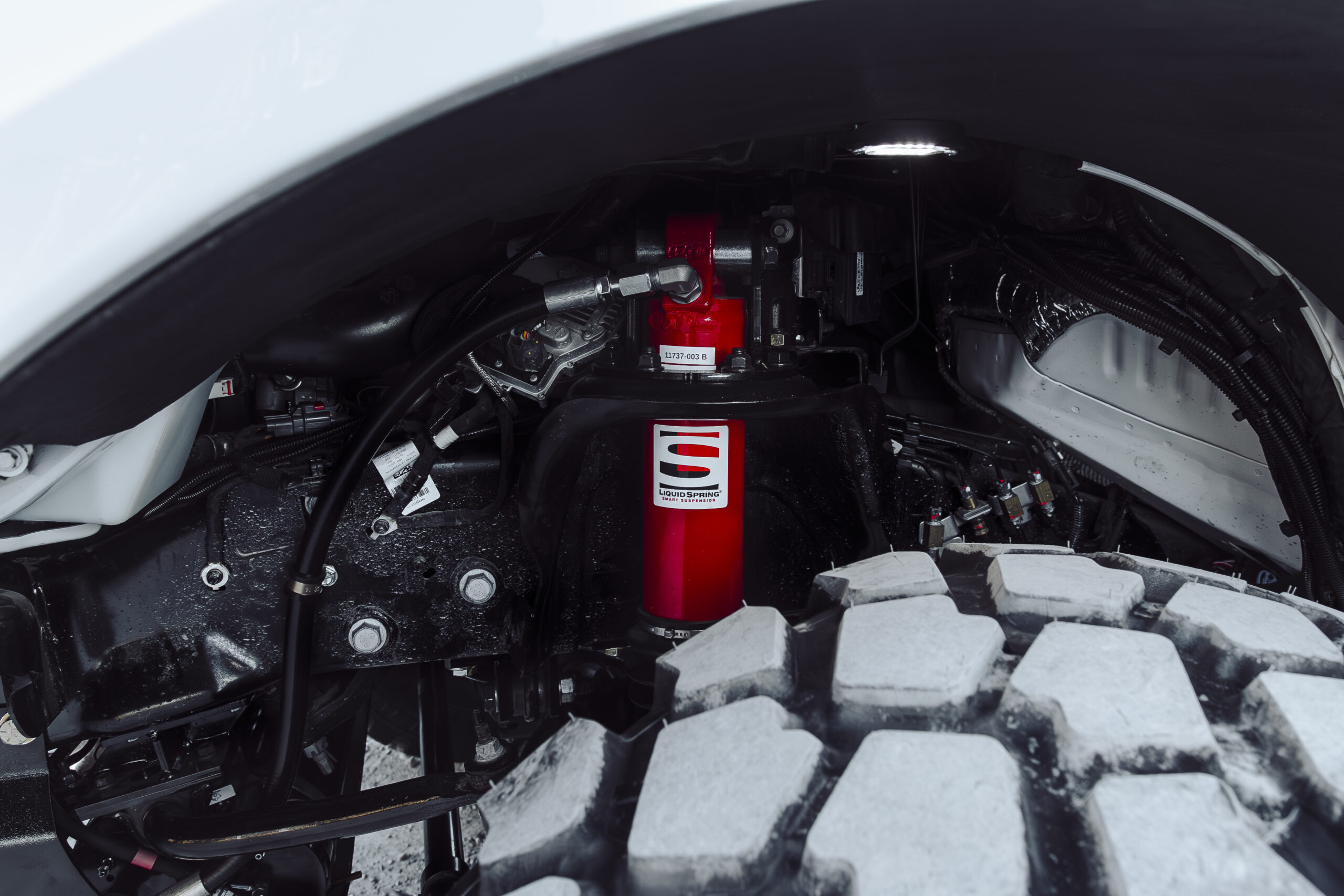 LiquidSpring Smart Suspension on wheel in snow